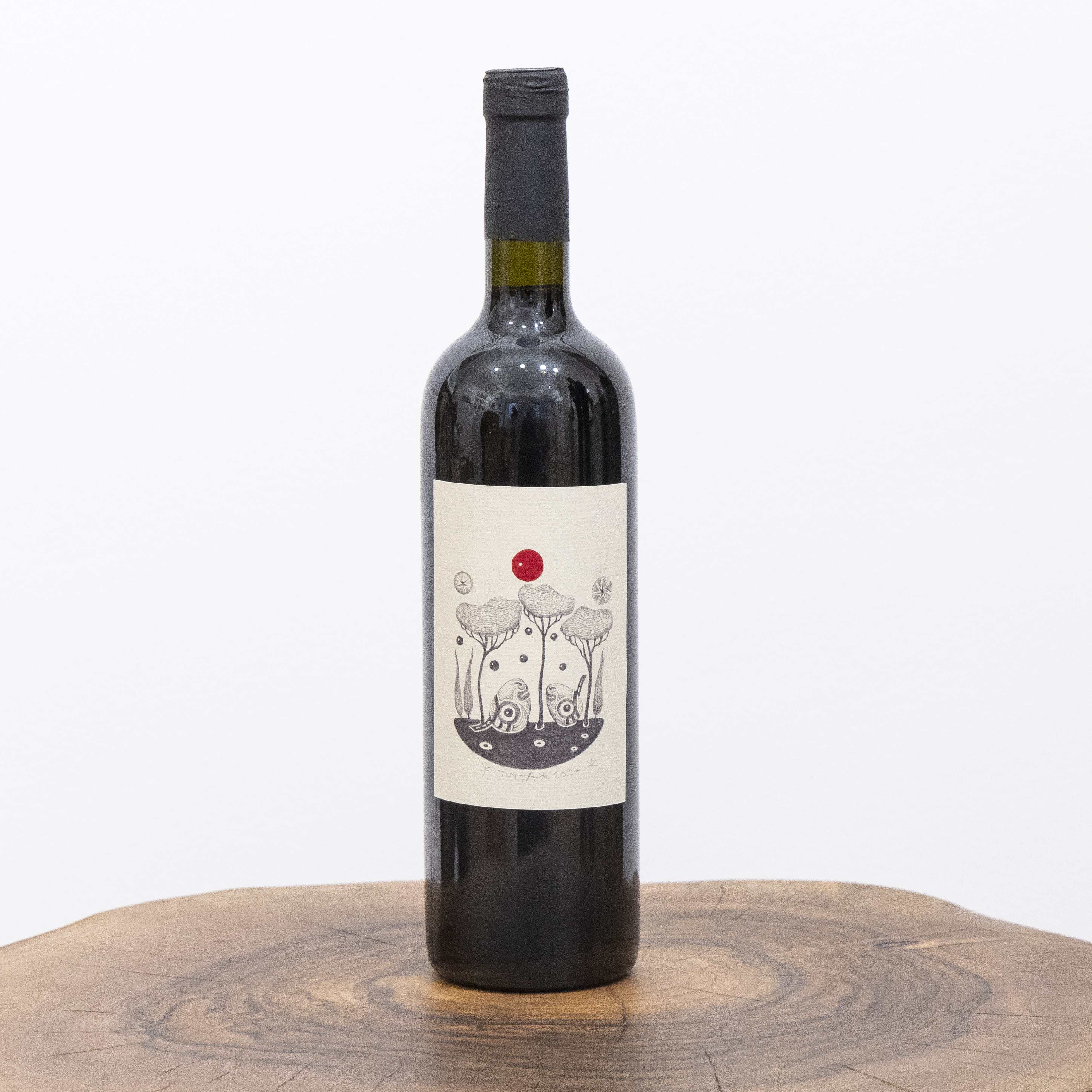 Vino Prinčič Mihael rdeče - avtor etikete Klavdij Tutta